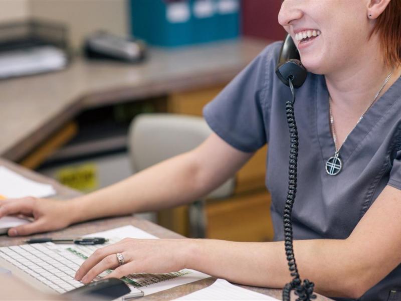 Animal Allergy receptionist taking a call